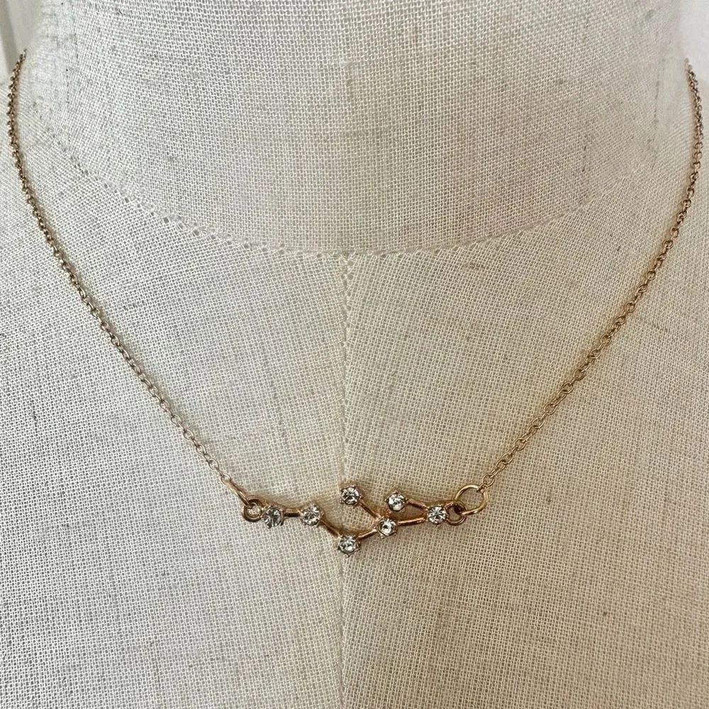 Gold tone rhinestone Leo constellation zodiac necklace